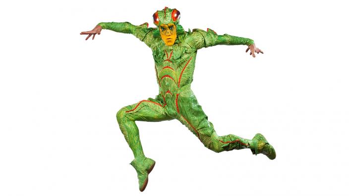 Circus performer posing like an insect