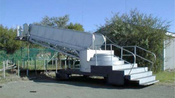 A passenger gangway on the back of a truck