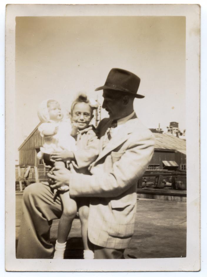Nonja held by her father shortly after arriving in Fremantle 