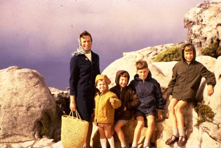 The Anstey family posing by rocks in Cape Town 