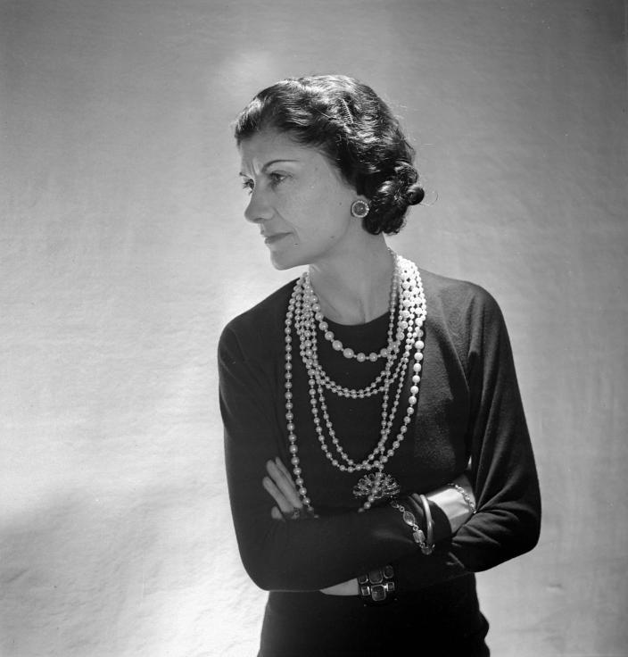 Image of a woman wearing pearls