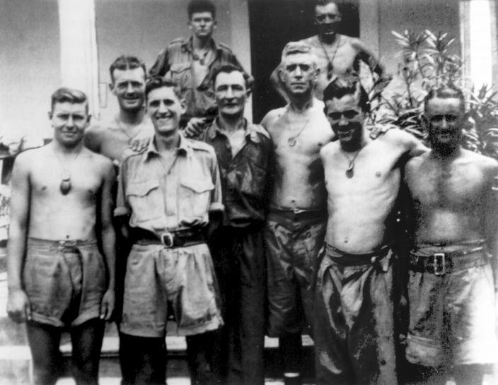 Medical Officer Capt Roger Dunkley (front row third from right) with members of 