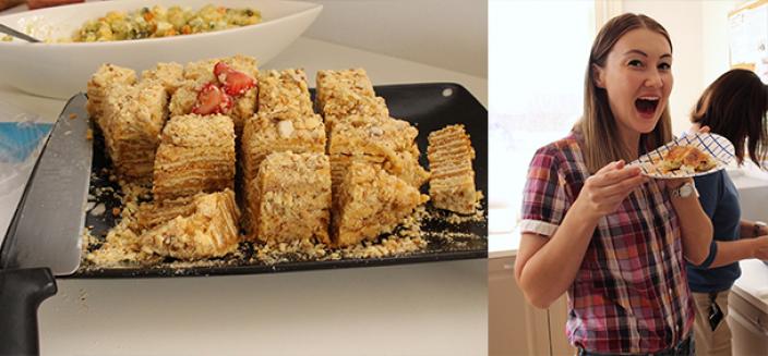 Golden coloured cake, woman holds plate of food eating