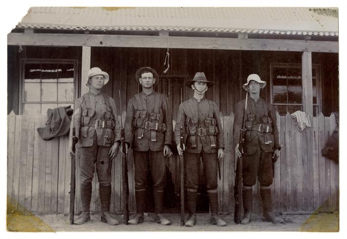 Photograph of four Australian soliders from World War One posing for a portrait