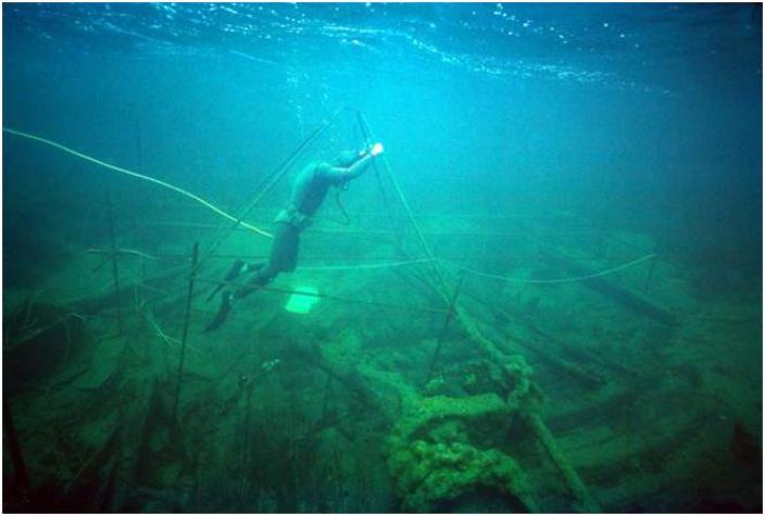 Underwater photograph of the James Matthews during archaeological excavations, 1976