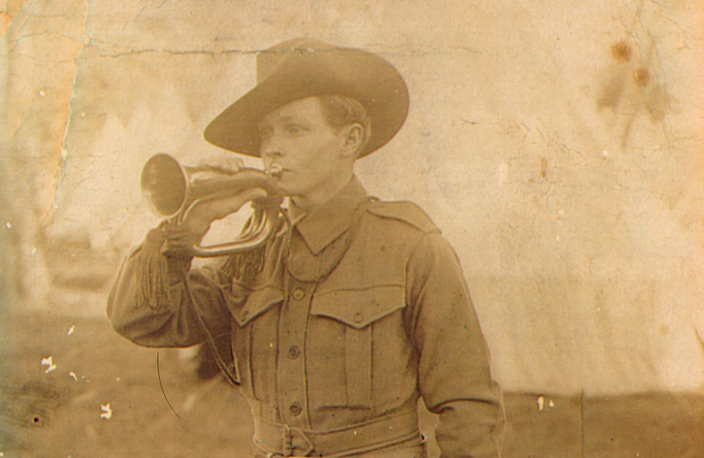 Roscoe playing his bugle at Blackboy Hill Camp. Dated 9-9-14