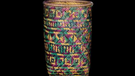 An open top basket with plaited weaving in split bamboo.