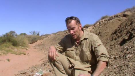Mikael Siversson talking to camera in the Australian outback