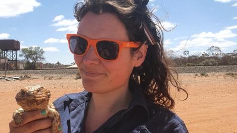 Technical Officer Kailah Thorn with a bobtail lizard