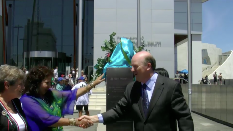 Arts Minister John Day unveiling the Welcome Walls