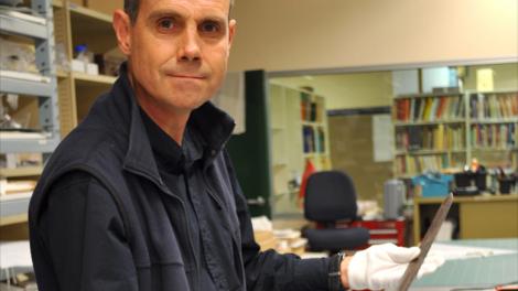 Western Australian Museum curator Stephen Anstey with the sabre used by Henry Dyson Naylor in 1854