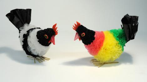 Decorated and painted chickens made from plastic bags and rubbish