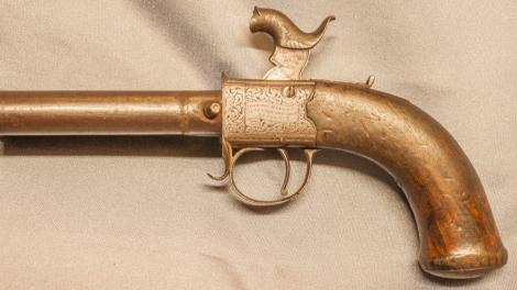 An ornate 19th century pistol