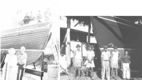 A crowd of people standing next to the boat they created