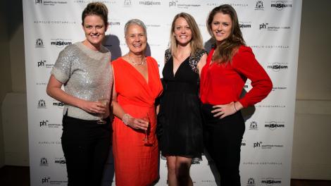 fashionable guests posing at the museum for the Costarella and Frock stars exhibition launch