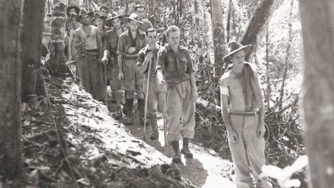 Australian troops walking the Kokoda jungle tracks