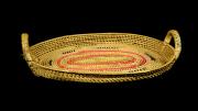 An oval tray with twining in a Samoan weave.