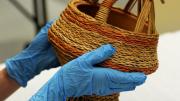 Megan inspecting the Kangri basket.