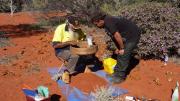 Archaeologists examining ochre