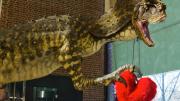 Dinosaur holding a fluffy heart