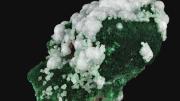 Green coloured  mineral called Malachite and white coloured mineral called dolomite 