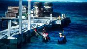 Divers testing equipment off the jetty before venturing out to the site.