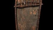 A Pig skin shield with a rattan Framework. Supposedly used by the younger initiate men. Back View.