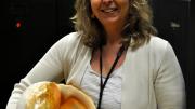 Our Curator of Molluscs holding a Baler shell specimen