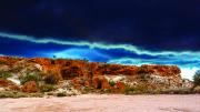 A visibly cloudy storm front dramatically approaching the shoreline