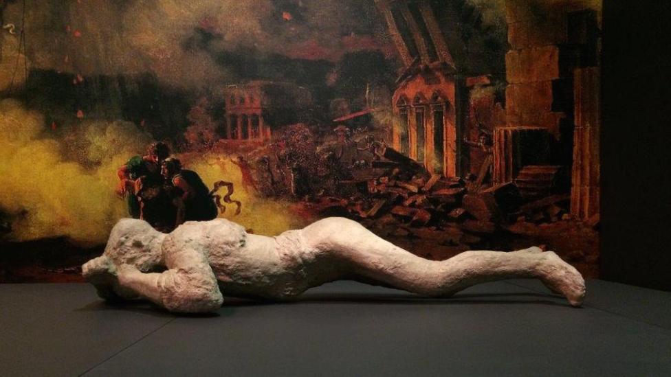 "A body cast of one of the victims of Pompeii, featured in the exhibition."
