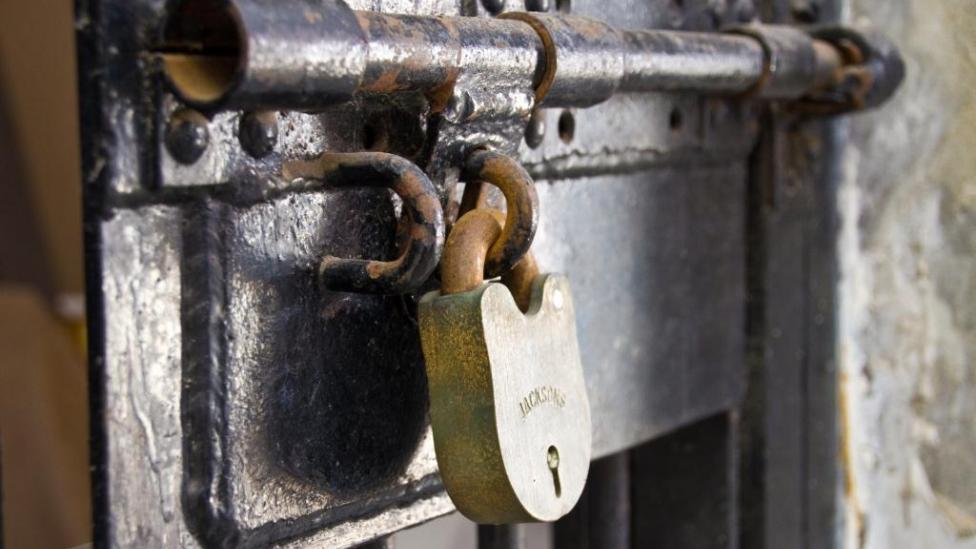 A locked jail cell