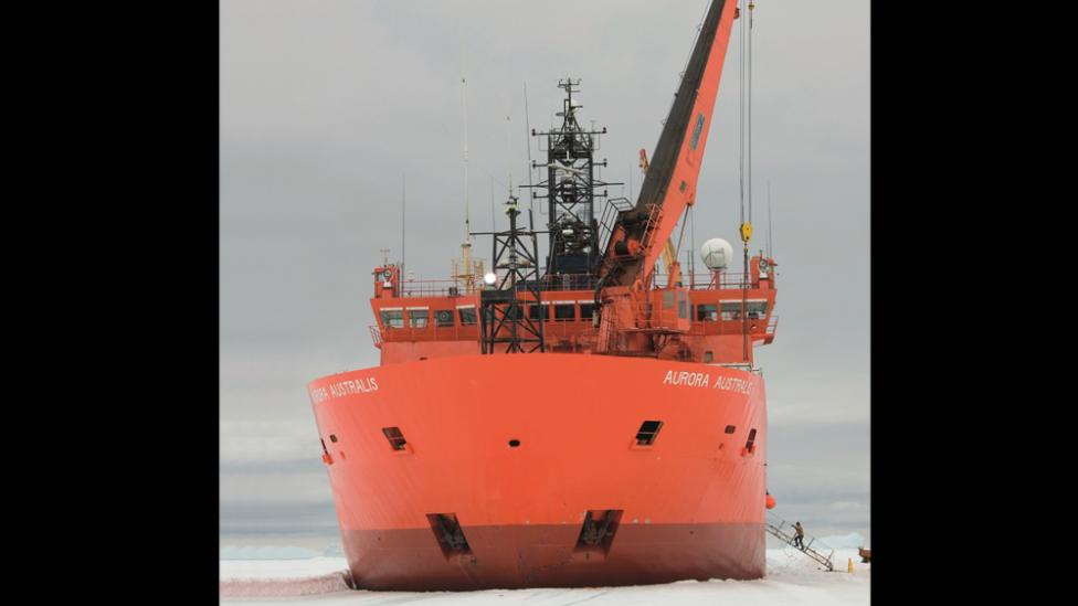 Ice braking ship docking in thick sea ice.