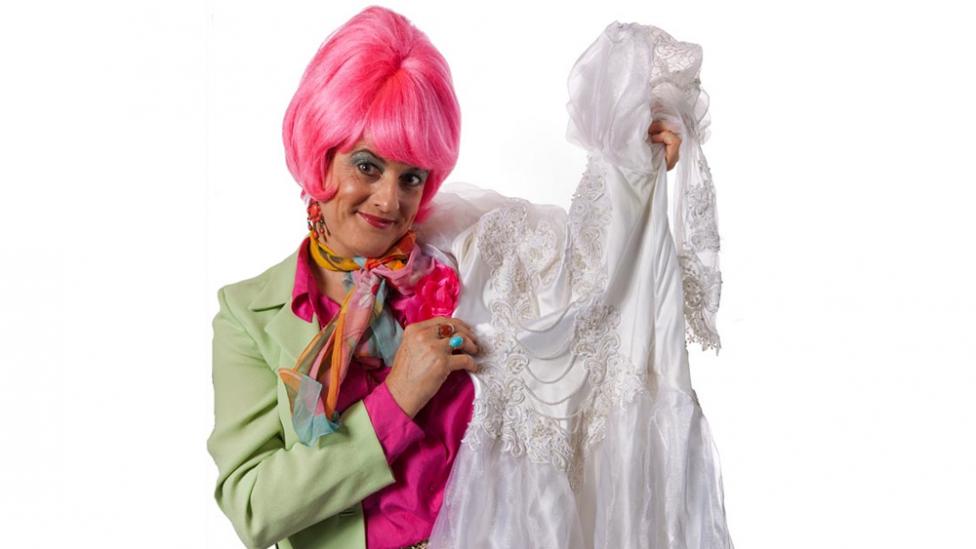 Ms Mavis Hamm showing off bridal wear