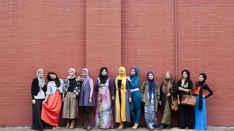 Muslim fashion bloggers Delina Darusman-Gala and Mya Arifin with a group of friends. Photo by Marinco Kojdanovski. © Powerhouse Museum, Sydney.   