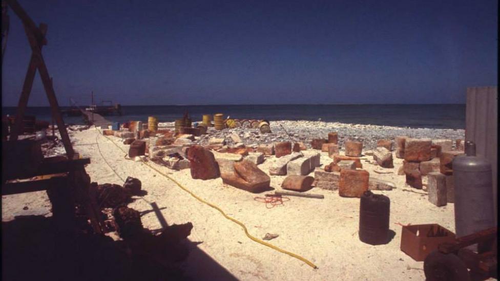 Batavia archway stones laid out after being raised from the site