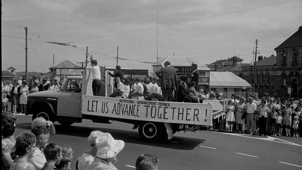 Aboriginal Advancement Council banner ‘Let Us Advance Together!” displayed on a truck at the Labour Day procession, Perth 1966 Image courtesy State Library of Western Australia