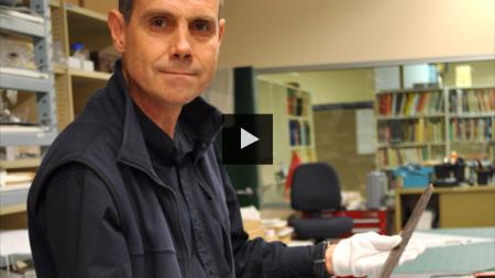 Western Australian Museum curator Stephen Anstey with the sabre used by Henry Dyson Naylor in 1854